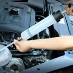 מזרק שמן ונוזלים לרכב ואופנוע